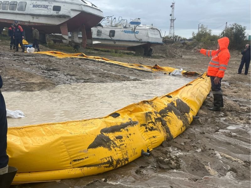 Heavy-duty WavePlus Flood Gate securing warehouse during flood alert