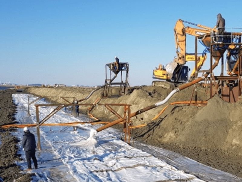 GeoTubes used for dewatering and sediment containment at a dredging site