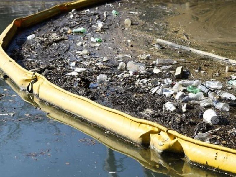 WavePlus Trash Booms protecting coastal area from floating trash and debris